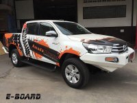 Выдвижные подножки с электроприводом Toyota Hilux 2015+ E-Board Выдвижные подножки с электроприводом Toyota Hilux 2015+ E-Board