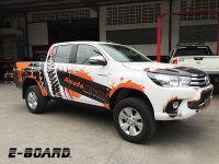 Выдвижные подножки с электроприводом Toyota Hilux 2015+ E-Board Выдвижные подножки с электроприводом Toyota Hilux 2015+ E-Board