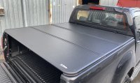 Крышка кузова из трех секций AR Design Nissan Navara Крышка кузова из трех секций AR Design Nissan Navara